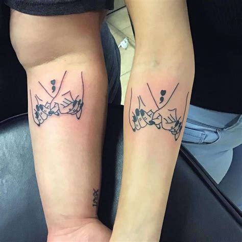 male and female best friend tattoos